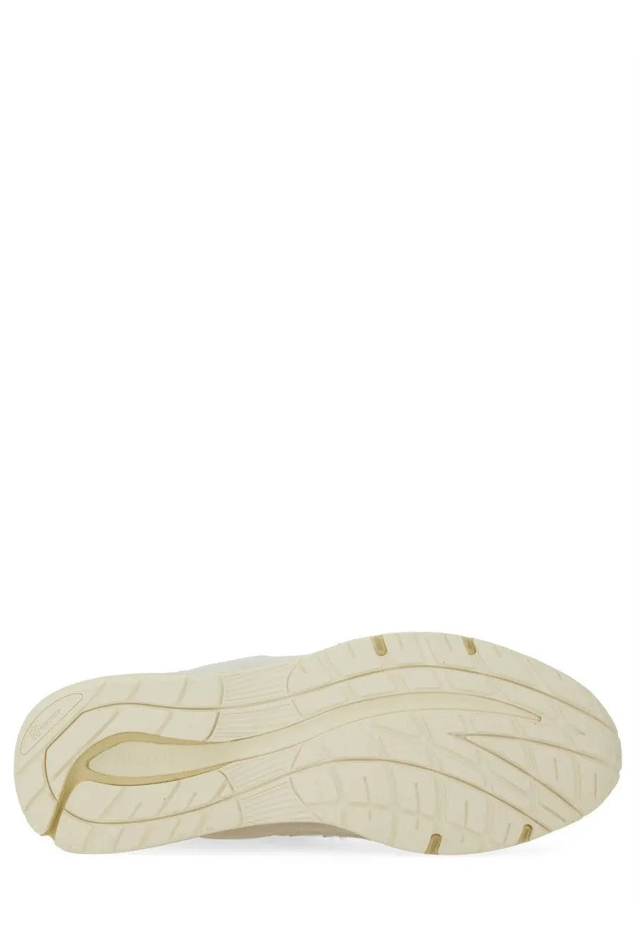 Cream-colored rubber sole with modern tread and gold accents on new balance unisex sneaker u991 white