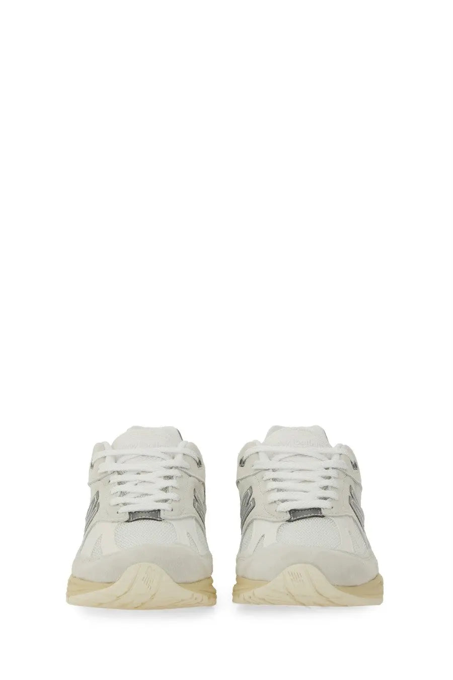 New Balance unisex sneaker U991 white with silver accents and cream-colored sole in a stylish athletic design