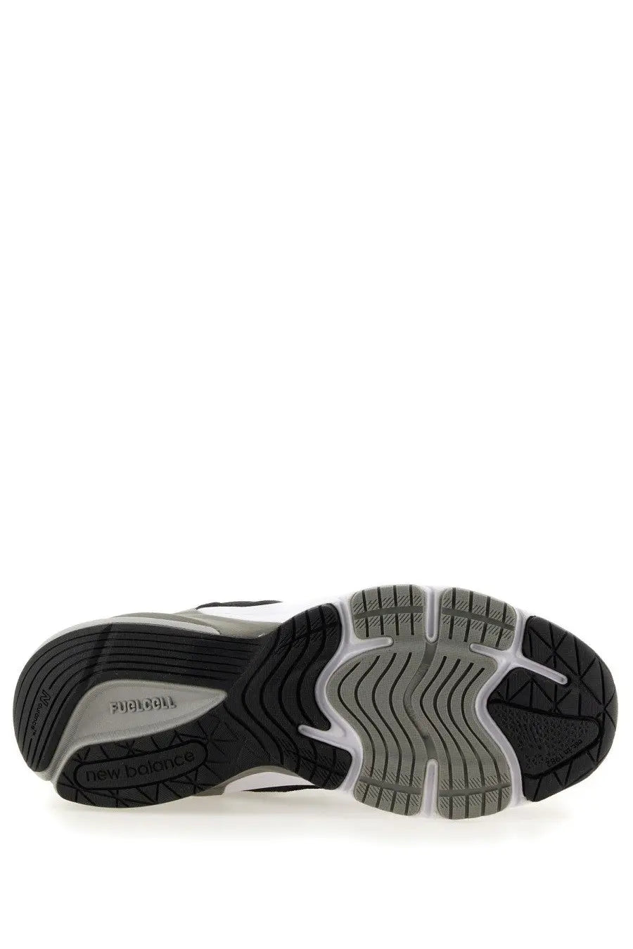 New balance women’s sneaker 990v6 black with black and gray running shoe featuring textured rubber outsole