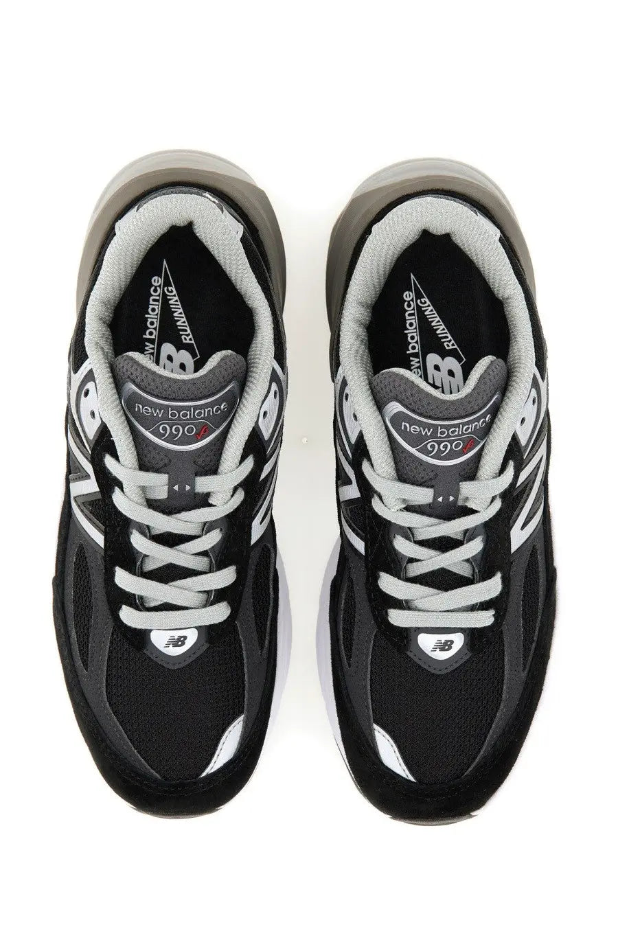 New Balance women’s sneaker 990v6 black with black and gray mesh upper and white laces for running and casual wear