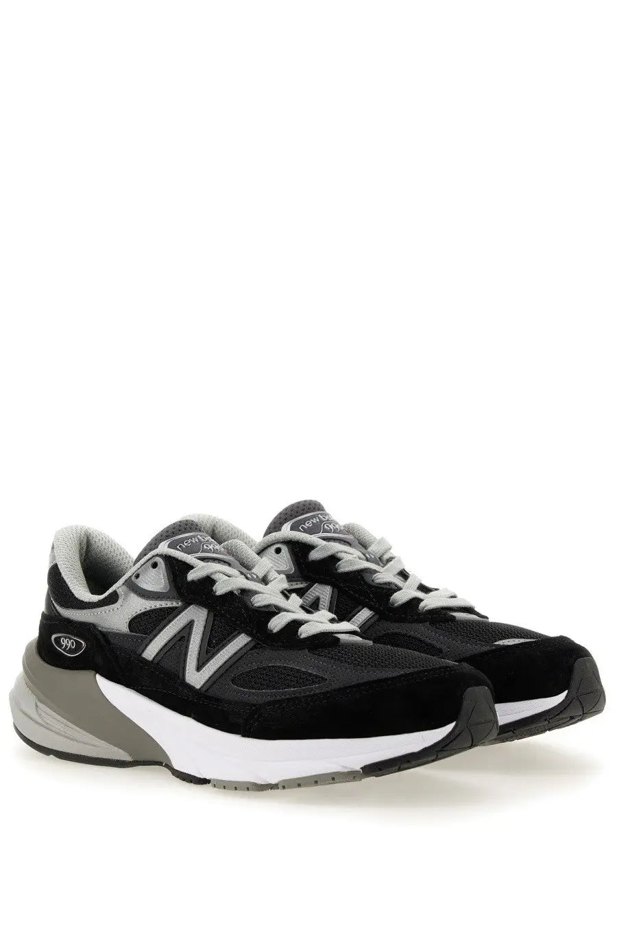 New balance women’s sneaker 990v6 black with black and gray mesh and suede upper and silver n logo