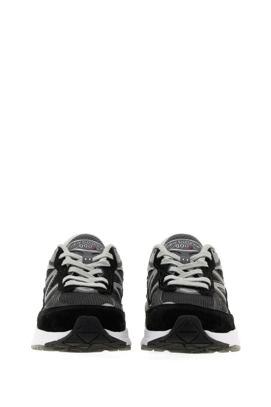 New balance women’s sneaker 990v6 black in black and gray with white laces and textured rubber sole