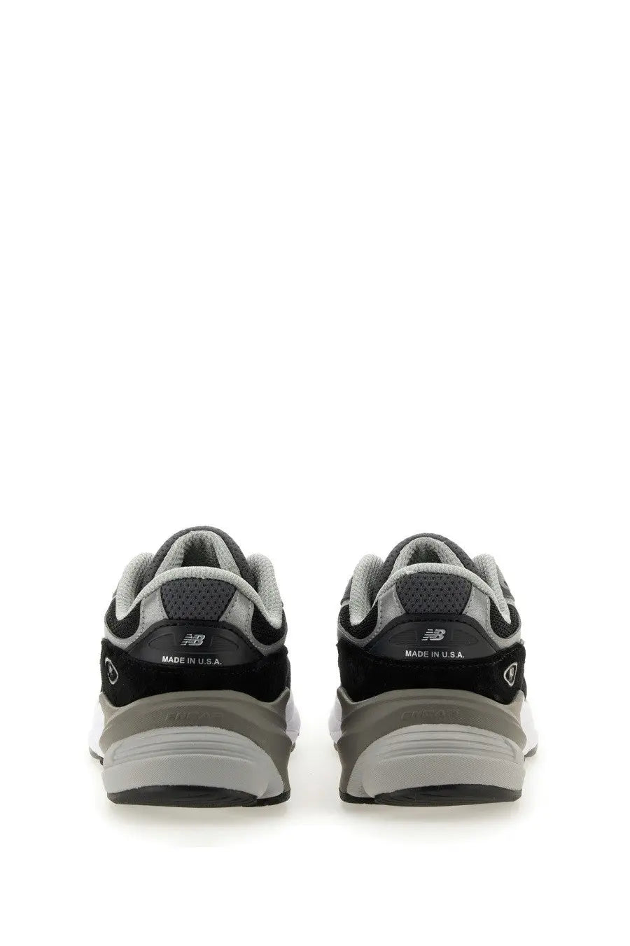 New balance women’s sneaker 990v6 black with black and gray textured mesh upper and rubber outsole