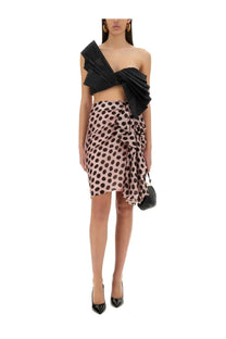 Nina Ricci women’s twisted polka dots top black paired with a black and beige polka-dot ruffled mini skirt