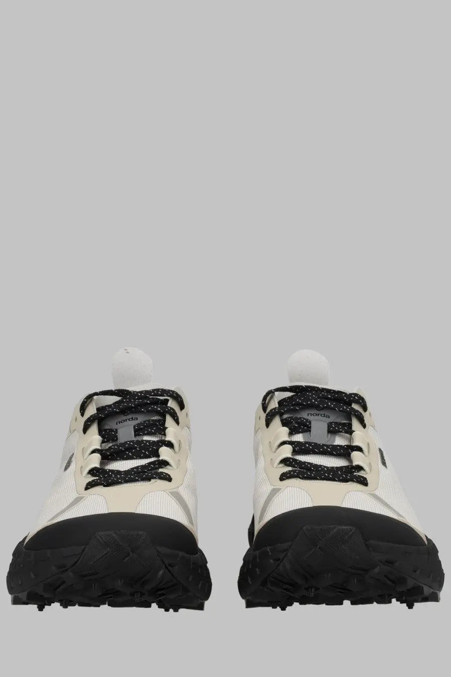 Norda women’s sneaker cinder bio dyneema grey trail running shoes with cream and black mesh upper and textured rubber sole