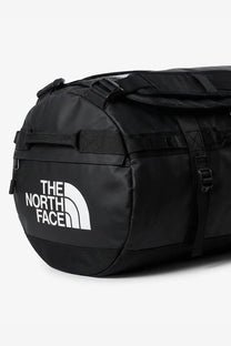 The north face men’s base camp duffel black recycled pvc backpack with white logo and reinforced straps