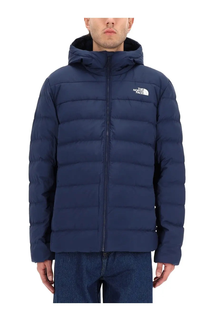 The North Face men’s navy blue puffer jacket with quilted design and white logo on chest
