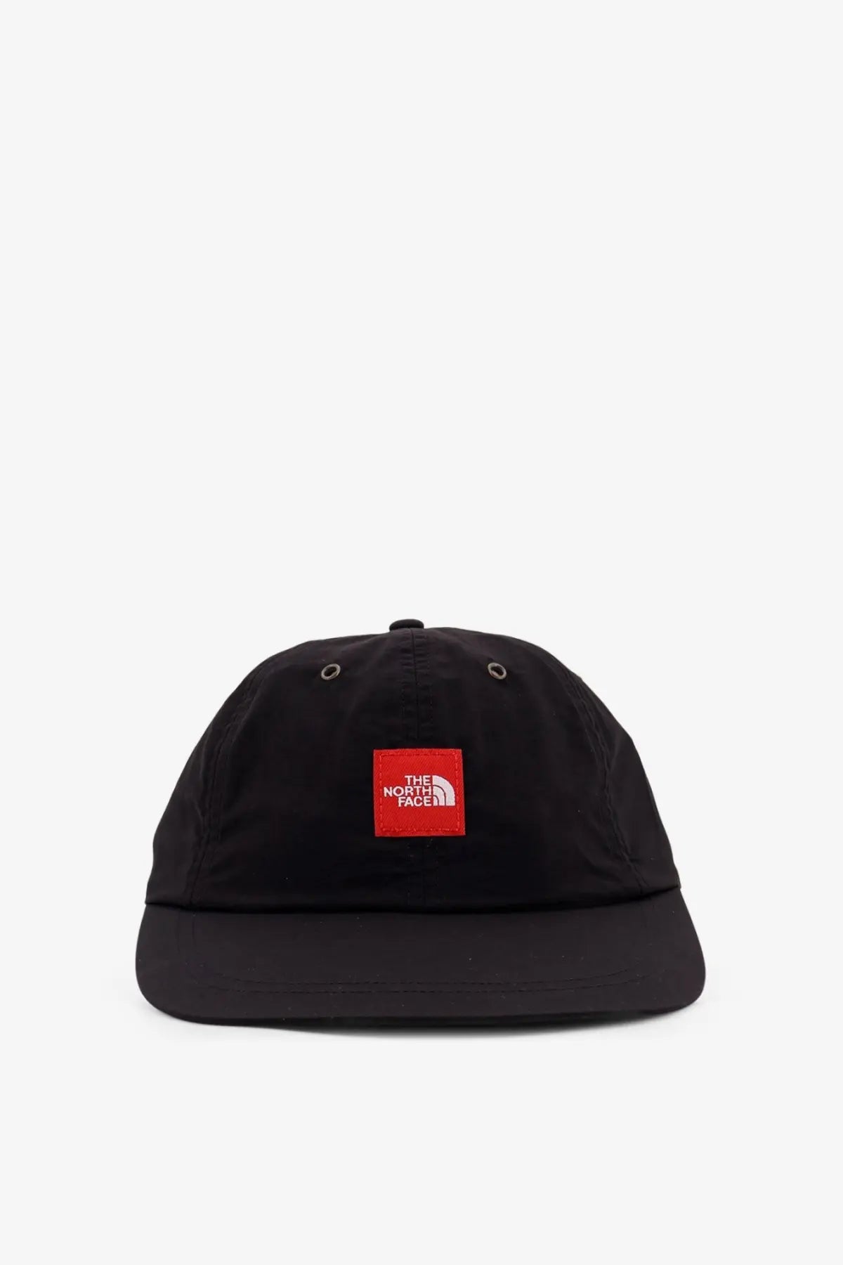 Black the north face men’s nylon baseball cap with red square logo patch on the front