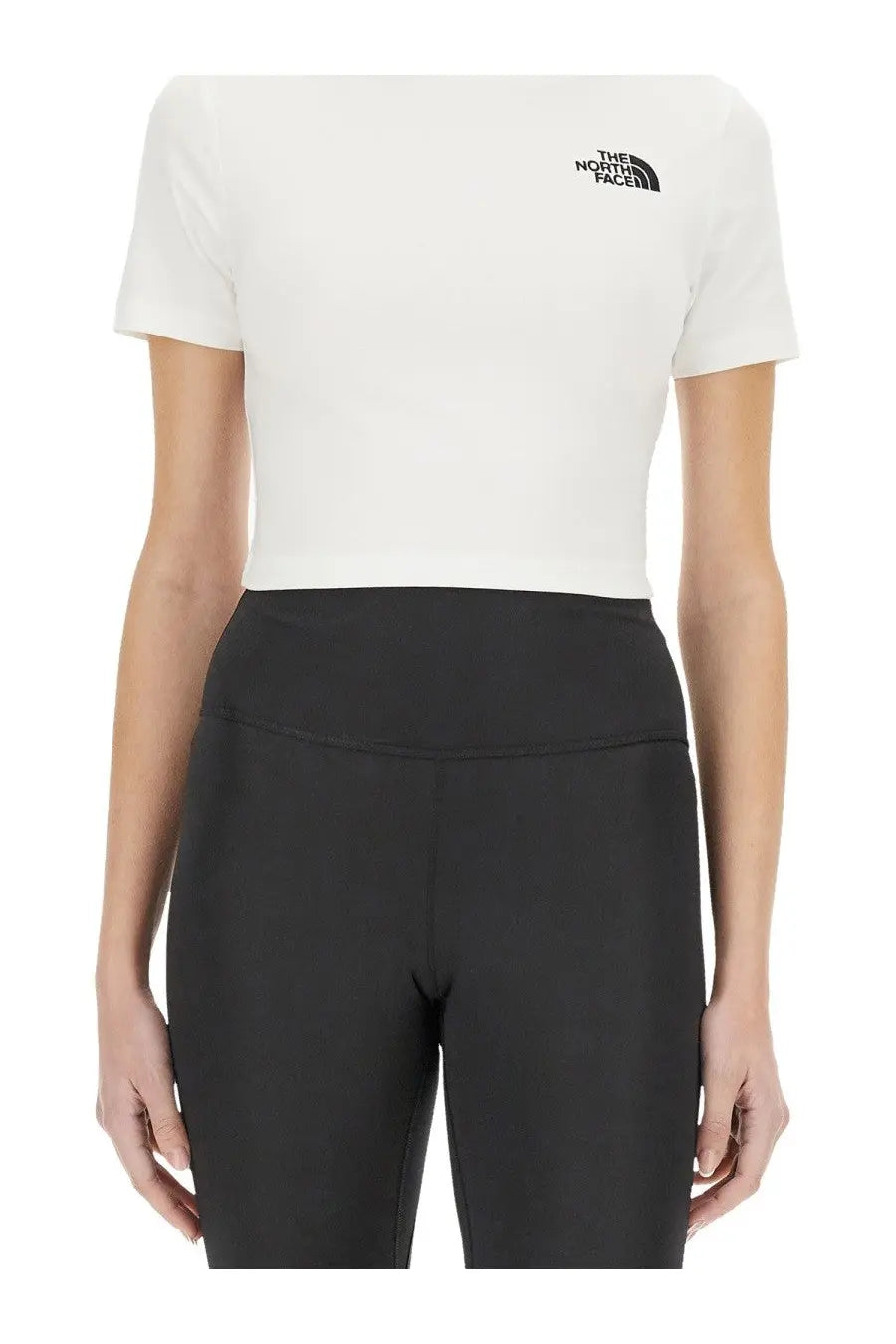 The North Face women’s white short-sleeved cropped shirt with black logo on the chest for casual wear