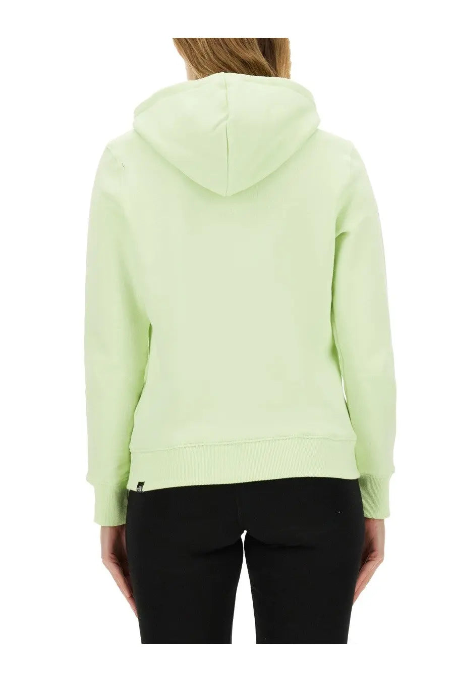 The North Face women’s sweatshirt green is a soft mint green hooded sweatshirt with ribbed hem cuffs and subtle logo