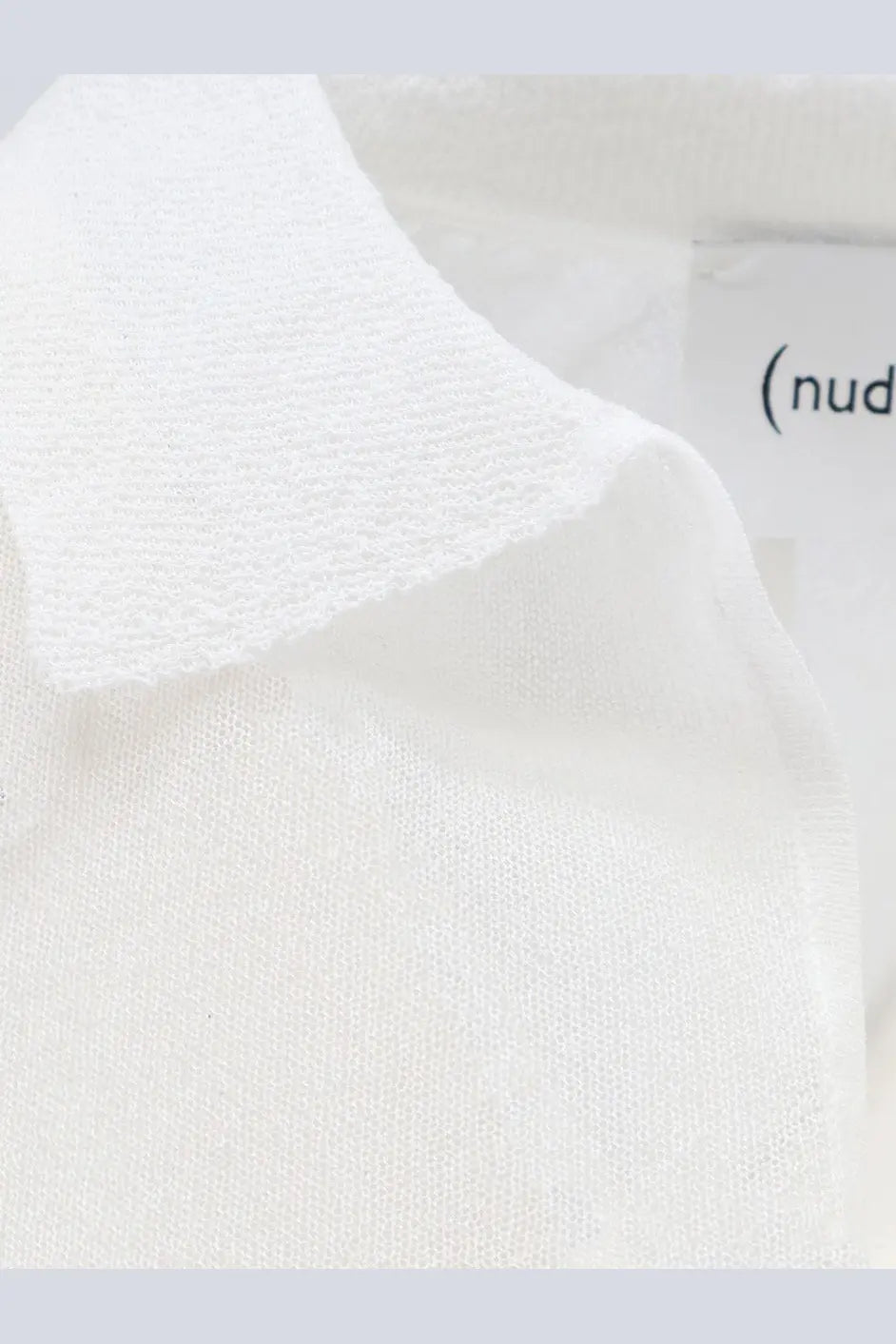 White knit polo shirt collar with soft textured fabric and subtle ribbed detailing in nude womens cotton blend polo shirt