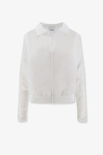 White sheer blouse with classic collar and elasticated cuffs made from cotton blend for womens casual wear