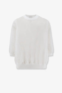 White soft textured long-sleeved cotton blend sweater with relaxed fit and ribbed cuffs for women