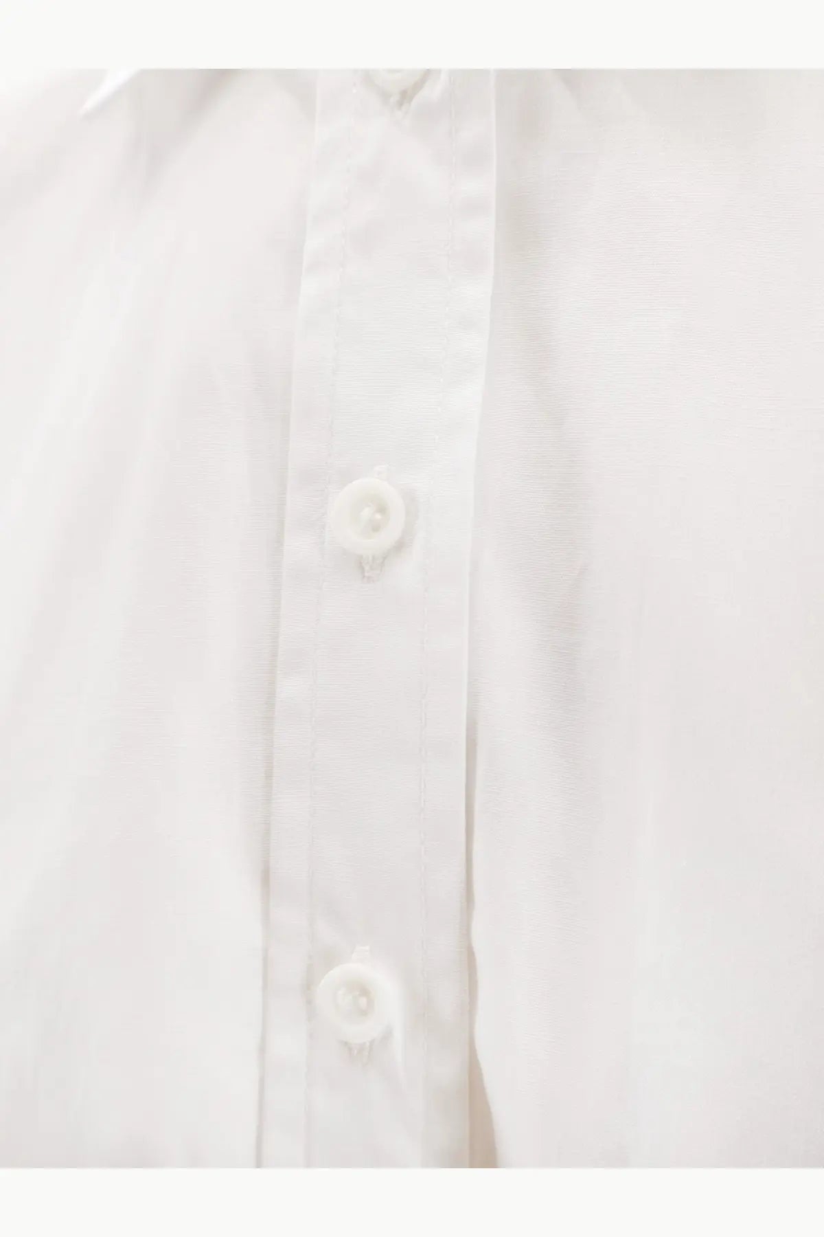 Nude womens cotton shirt white with crisp cotton fabric and matching white buttons along the front placket