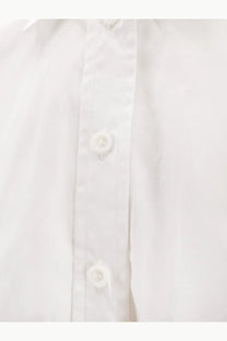 Nude womens cotton shirt white with crisp cotton fabric and matching white buttons along the front placket