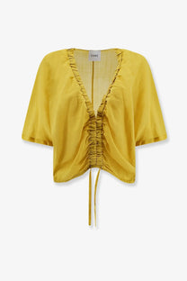 Nude women’s linen blend shirt cedar with mustard yellow lightweight cropped top and ruched front drawstring waist