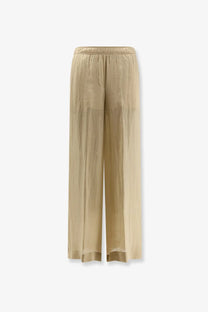 Nude women’s linen blend wide-leg trousers in beige with elastic waistband and flowing lightweight fabric