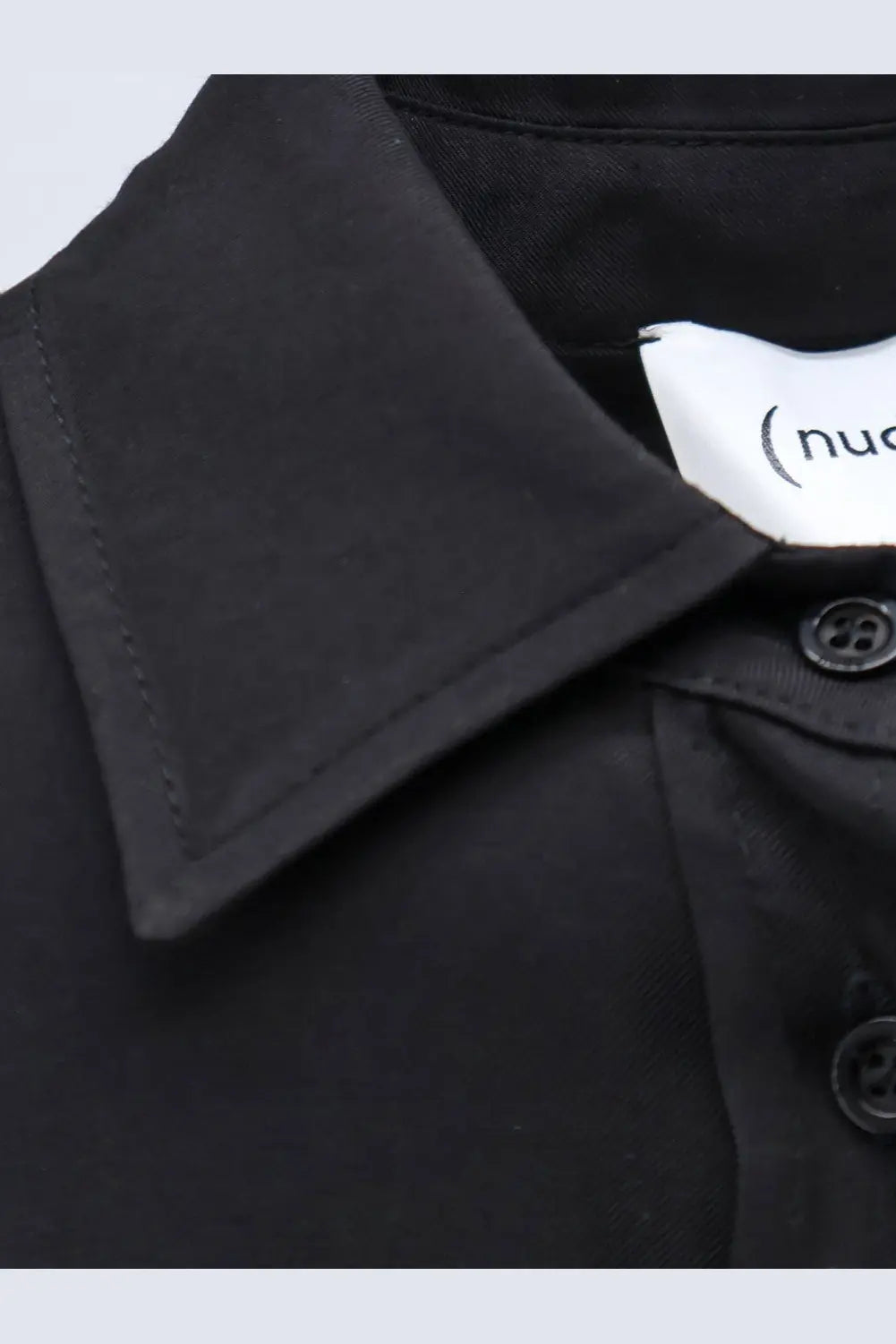 Black collared viscose shirt for women with subtle texture and matching black buttons from nude collection