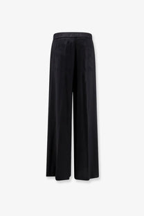 Black wide-leg viscose trousers for women with smooth fabric and elastic waistband from Nude collection