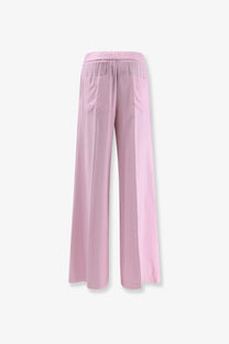 Soft pink wide-leg viscose trousers for women with elastic waistband and two front pockets nude style