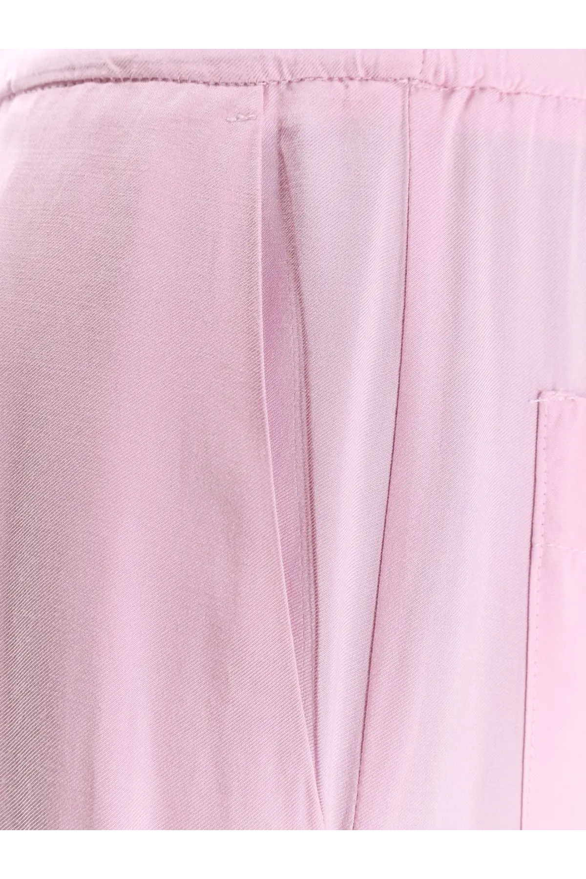 Nude women’s viscose trousers pink soft pink woven fabric pants with subtle texture and clean stitching