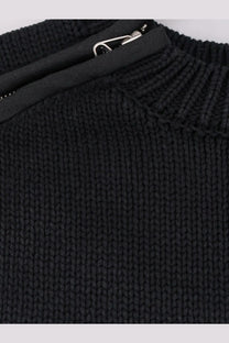 Oamc peacemaker men’s black cotton sweater with ribbed texture and silver zipper pull on the front