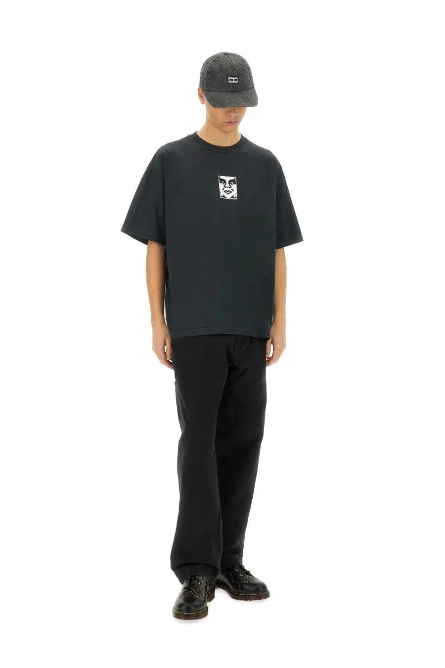 Obey men’s black short-sleeved t-shirt with white icon face graphic print on chest made from soft cotton material
