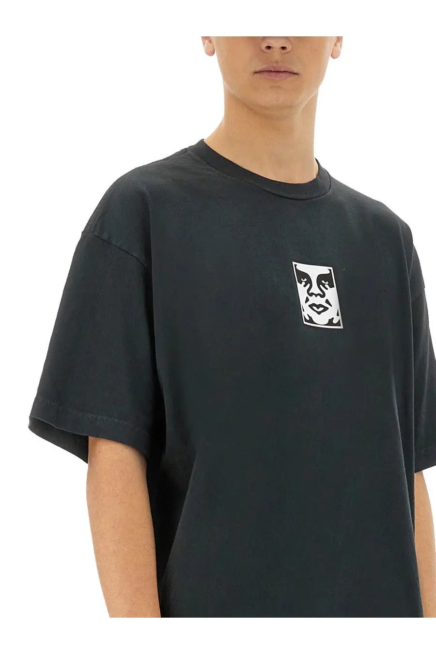 Black obey men’s short-sleeved t-shirt with white rectangular stylized face graphic on left chest front