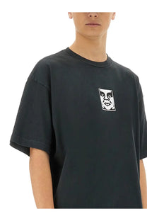 Black obey men’s short-sleeved t-shirt with white rectangular stylized face graphic on left chest front