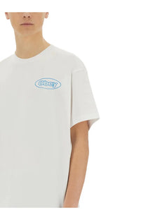 Obey men’s reaction white cotton t-shirt with light blue embroidered obey logo in oval on the chest