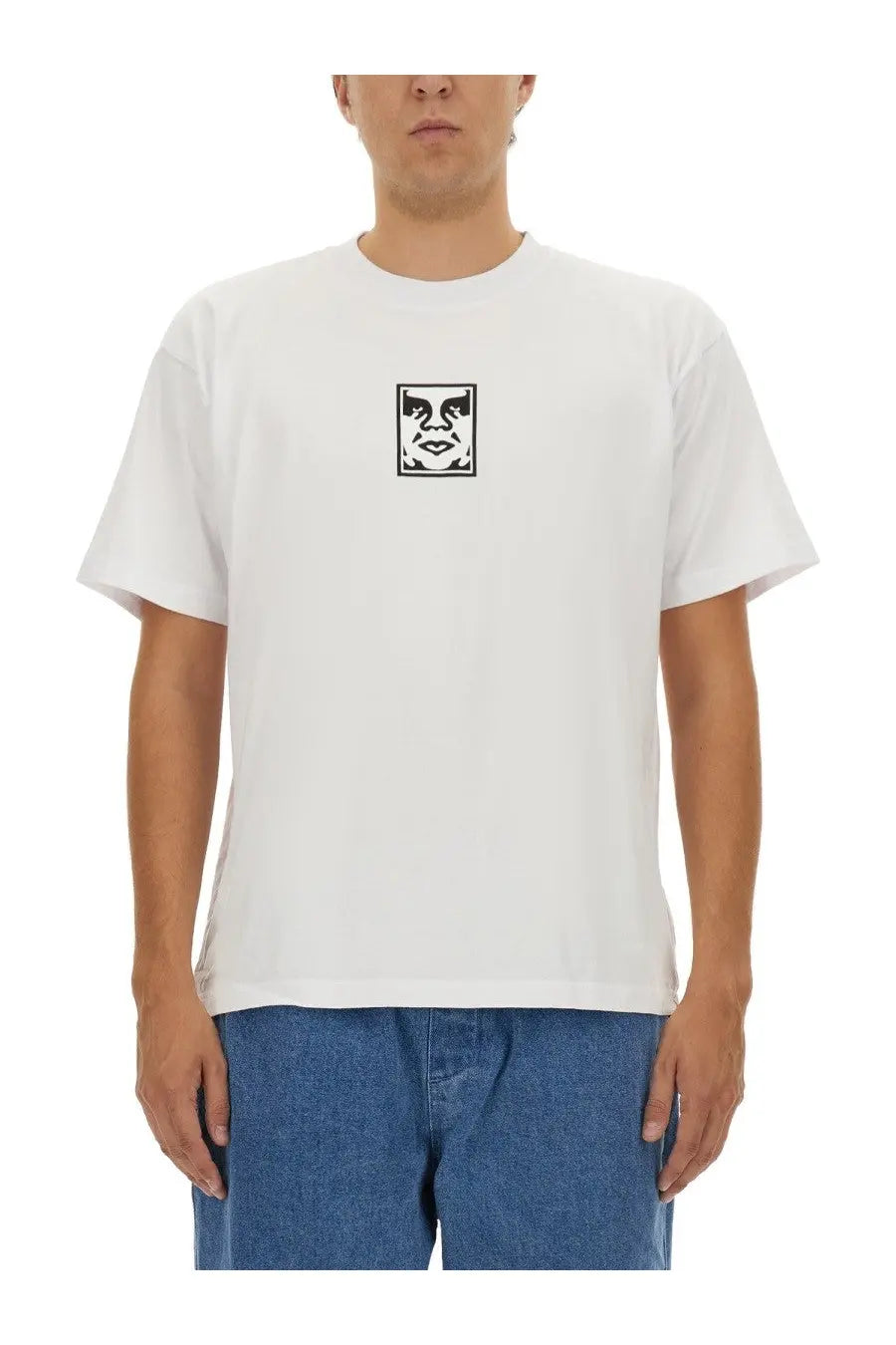 Obey men’s white short-sleeved cotton t-shirt with black rectangular graphic of a stylized face on the chest