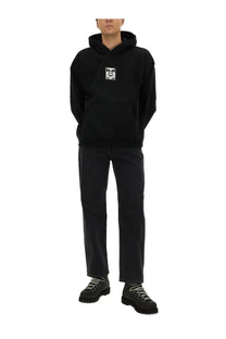 Obey men’s black sweatshirt hoodie with a white graphic patch on the chest made from soft cotton material