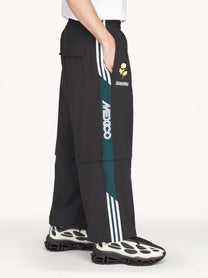 adidas Originals x Willy Chavarria Men's Oversized Woven Track Trousers Black, view 5
