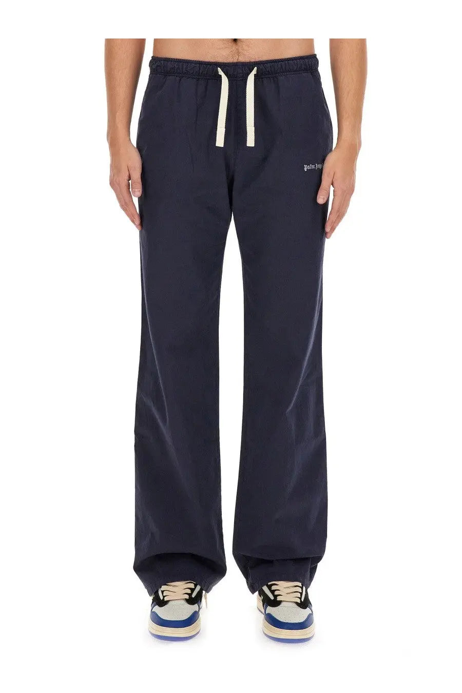 Palm Angels men’s dark navy blue drawstring sweatpants with white cord and subtle embroidered branding on the thigh