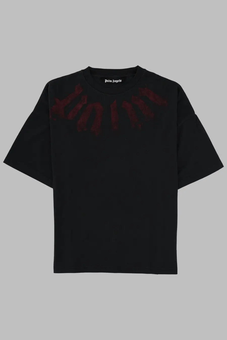 Palm angels men’s black shirt with faded red wing graphic across the chest in a soft cotton material