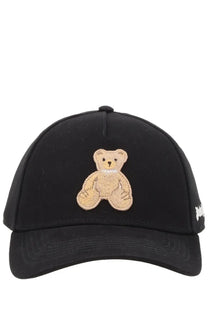 Palm Angels women’s black baseball cap with beige embroidered teddy bear patch on front for casual wear