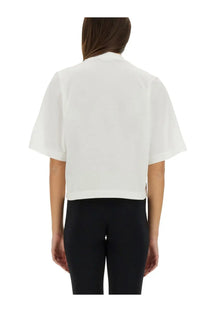 White cropped short-sleeved cotton blouse with clean minimalist design palm angels women’s shirt white front view