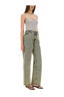 Paloma Wool women’s wide-leg denim jeans in faded olive green with visible stitching and classic five-pocket design