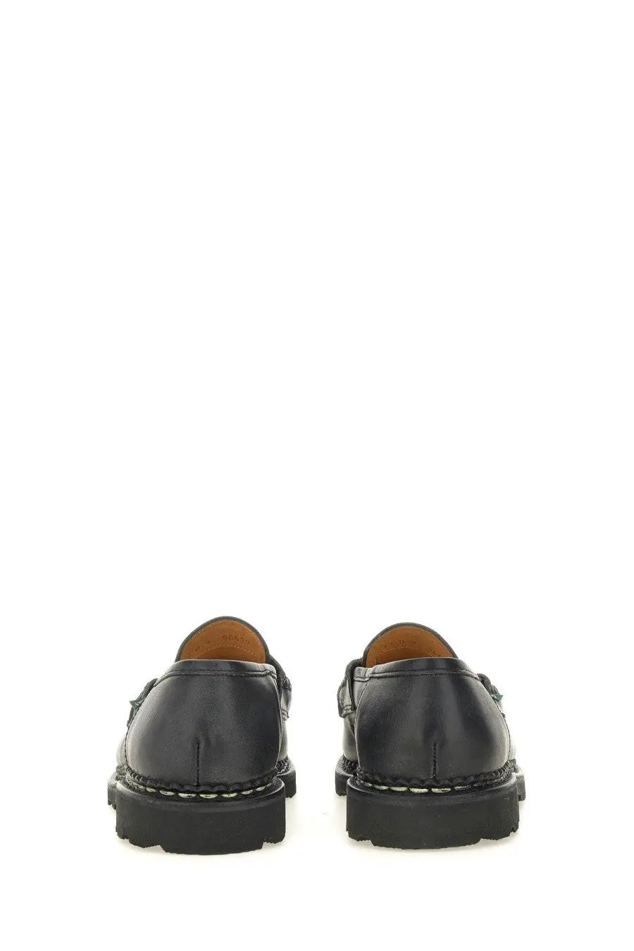 Paraboot men’s leather loafers black with glossy finish and contrasting white stitching along the soles