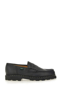 Paraboot men’s black leather penny loafer with textured rubber sole and visible stitching along the edge