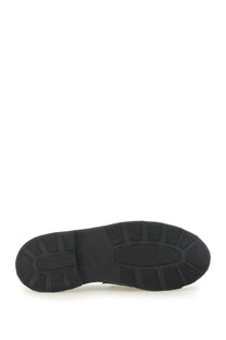 Black rubber sole with textured blocky tread pattern on paraboot men’s leather loafer black