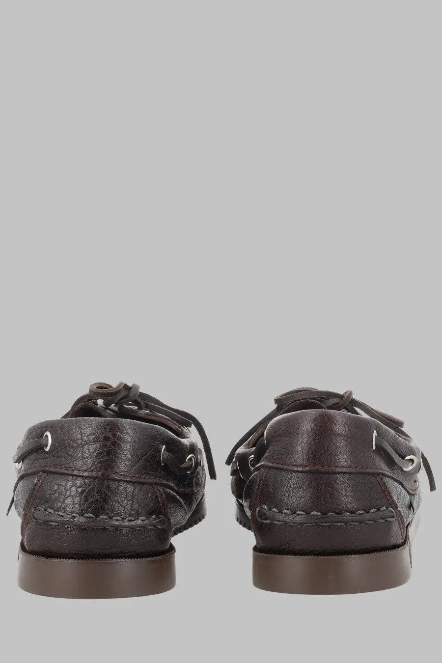 Dark brown leather boat shoes with visible stitching and metal eyelets from paraboot mens mocassino barth in pelle brown