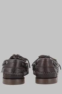 Dark brown leather boat shoes with visible stitching and metal eyelets from paraboot mens mocassino barth in pelle brown