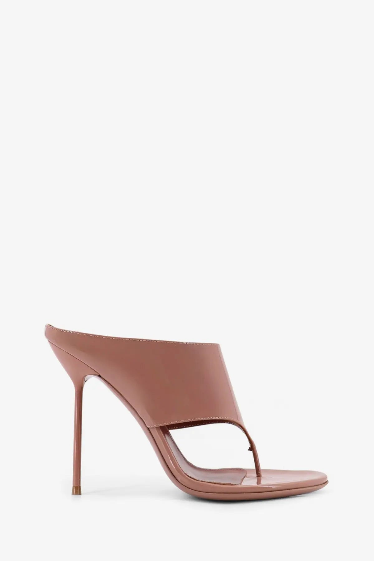 A sleek nude leather mule sandal with high stiletto heel and minimalist design from Paris Texas women’s collection