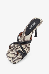 Black and beige snake-print leather mule sandal with a slender heel from Paris Texas women’s lorena collection