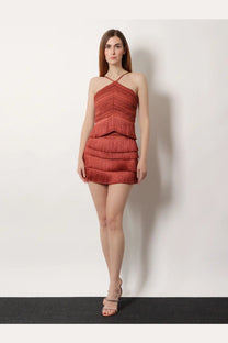 Patbo women’s terracotta mini skirt with textured layered fringe and halter neckline in terracotta color