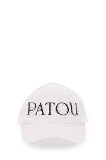 White patou women’s baseball hat featuring black embroidered logo on a cotton fabric for casual wear