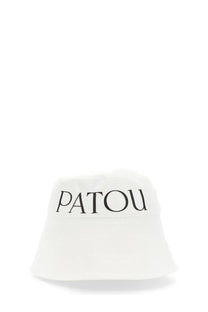 White Patou bucket hat with black embroidered logo front in a soft fabric designed for women’s casual wear