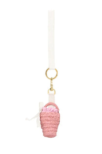 Pink woven basket charm with white ribbon handle and gold-tone ring attachment for patou women’s charm bucket blue