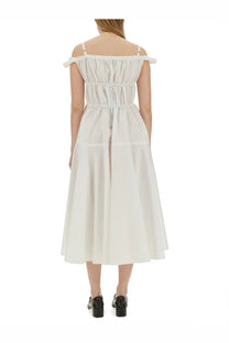 Patou women’s long dress in white features an off-the-shoulder midi design with gathered bodice and thin straps